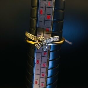 Gold and Silver Crossed Ribbon Ring with Clear Stones - natural diamonds